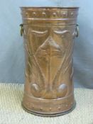 An Arts and Crafts flared copper stick stand with brass loop handles (H60 x D34cm)