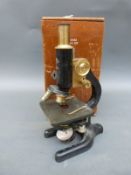 W R Prior & Co of London brass microscope in wooden box complete with lenses,