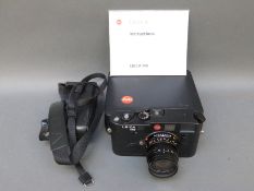 Leica M6 35mm camera with Summicron-M 1:2/50 lens,