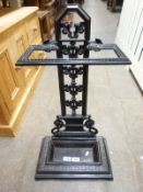 A cast iron umbrella stand,