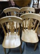 Four beech Windsor kitchen chairs