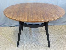 A retro oak and ebonised framed circular kitchen or dining table (H71 x D122cm)