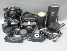 A quantity of mainly Minolta SLR cameras, lenses and accessories,