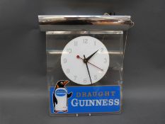 Draught Guinness illuminated electric advertising clock in original postage box marked 'The Acme