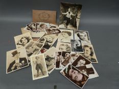 Four signed film interest photographs comprising Grace Moore, Ruby Keeler,