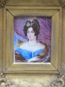 A 19thC portrait miniature on ivory of a lady with fur stole, signed lower right A.F.