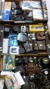 Three boxes of cameras amd accessories to include Zenit, Agfa, Yashica, Kodak, Pentax etc,
