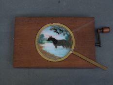 Two late 19th/20th century magic lantern slides to include a hand turned kaleidoscope example and a