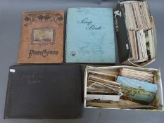 Three albums of postcards including 19th/20th C music hall performers and two boxes of
