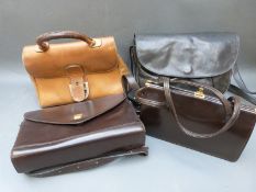 A collection of handbags including Delvaux