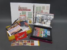 A box of loose stamps and booklets,