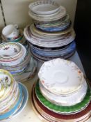 A collection of cups, saucers and plates including Art Deco/retro examples,
