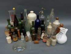 A quantity of stoneware and glass bottles to include John Berry & Co.