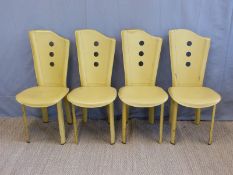 Four retro leather upholstered chairs with cut out decorative splats