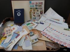 A box of loose stamps,