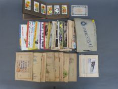 A quantity of cigarette card albums, mainly 1930s, including tennis, football, motor cars,