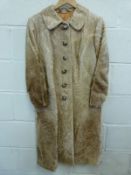 A retro 1960's ladies fur/leather coat