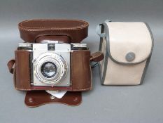 Paxina 35 camera and a Kodak Brownie Vecta example