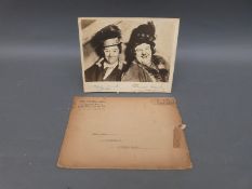 Stan Laurel and Oliver Hardy rubber stamp signed photograph,