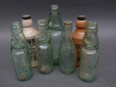 A quantity of Stroud and Cirencester local interest stoneware and glass bottles