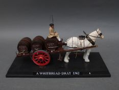 A brass Whitbread advertising sign, various Whitbread ceramics,