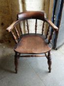 An elm seated Windsor armchair