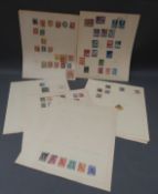 A collection of Austrian stamps on loose album pages,