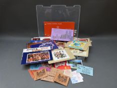 A box of PHQ cards and stamp booklets