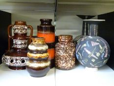 A collection of retro vases and lamps including East German examples