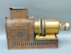 A late 19thC H Baird Edinburgh magic lantern with later electric light,