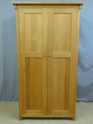 A contemporary oak wardrobe (H193 x W96 x D59cm)