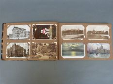An album of approximately 200 mainly early 20thC UK topographical postcards including South Coast