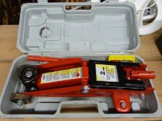 A cased trolley jack and two socket sets