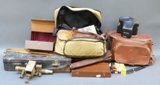 A quantity of cameras and accessories to include Canon AE1 Hanimax 75-200 1:4.