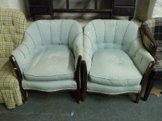 A pair of tub chairs