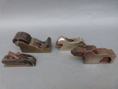 Four small woodworking planes including a possibly Norris chariot plane, length 13cm,