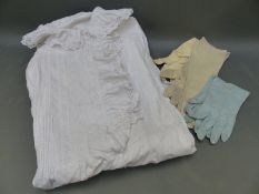 A vintage cotton night gown and two pairs of kid leather gloves