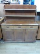 A retro light elm/oak sideboard with plate rack,