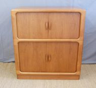 A retro 1960s/70s Dyrlund Danish drinks cabinet with tambour drawers.