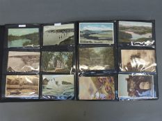 An album of approximately 450 mainly early 20thC UK topographical postcards including Wales,