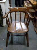An elm seated captain's chair