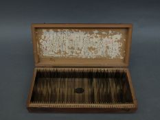 A fitted wooden case containing 26 early 20thC slides of mountaineering scenes,
