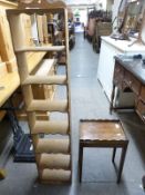 A narrow set of pine shelves and a tray top occasional table,