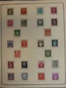 An album containing a collection of mint stamps from France