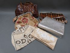 Six vintage ladies clutch bags to include a snake skin example,