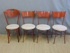 Four retro upholstered metal chairs
