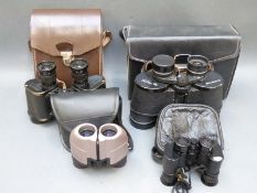 Four pairs of binoculars comprising Russian 7x35, Kershaw 6x30 with military markings, Tohyou 6x15,