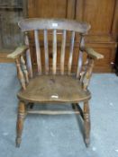 A Captain's or desk arm chair with elm seat