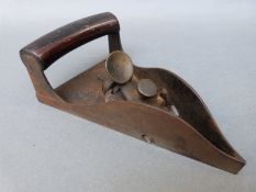 An unusual segment or triangular shaped vintage woodworking plane,