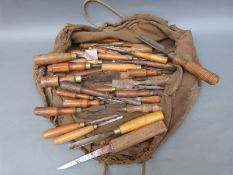 A quantity of vintage woodworking gouges and chisels